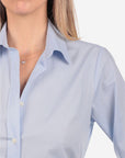 Camicia donna azzurra in cotone 100% tinta unita, realizzata artigianalmente a Napoli