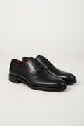 Scarpa stringata di pelle abrasivata